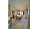 Dining room with wood table and chairs near a china cabinet at 699 Monaco Dr, Punta Gorda, FL 33950