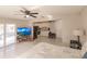 Main bedroom with kitchenette and sliding glass doors at 701 Coral Way, Englewood, FL 34223