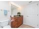 Bathroom features granite vanity and tiled floor at 101 N. Marion Court # 222, Punta Gorda, FL 33950