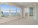 Bedroom with stunning water views and private balcony at 101 N. Marion Court # 222, Punta Gorda, FL 33950