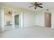 Bedroom with access to balcony and large windows at 101 N. Marion Court # 222, Punta Gorda, FL 33950