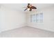 Bedroom with ceiling fan and window shutters at 101 N. Marion Court # 222, Punta Gorda, FL 33950