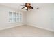 Bedroom with window shutters and ceiling fan at 101 N. Marion Court # 222, Punta Gorda, FL 33950