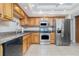 Well-equipped kitchen featuring granite countertops and stainless steel appliances at 101 N. Marion Court # 222, Punta Gorda, FL 33950