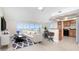 Bright living room with water view, comfortable seating, and dining area at 101 N. Marion Court # 222, Punta Gorda, FL 33950