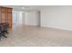Spacious living room with tile floors and access to kitchen at 101 N. Marion Court # 222, Punta Gorda, FL 33950