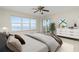 Main bedroom with water views, balcony access, and dresser at 101 N. Marion Court # 222, Punta Gorda, FL 33950