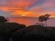 Stunning sunset over calm water from private balcony at 101 N. Marion Court # 222, Punta Gorda, FL 33950