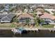 Aerial view of single Gathering home with private pool and canal access at 1131 Via Tripoli, Punta Gorda, FL 33950