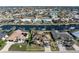 Aerial view of a canal front home with lush landscaping at 1131 Via Tripoli, Punta Gorda, FL 33950