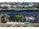 Aerial view of waterfront home with private dock and boat lift at 1131 Via Tripoli, Punta Gorda, FL 33950