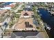 Aerial view of single-Gathering home with pool and canal access at 1131 Via Tripoli, Punta Gorda, FL 33950