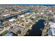 Aerial view of house and lot, showing waterfront location and amenities at 1131 Via Tripoli, Punta Gorda, FL 33950