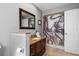 Bathroom with walk-in shower and decorative shower curtain at 1131 Via Tripoli, Punta Gorda, FL 33950