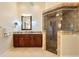 Bathroom with granite vanity and large walk-in shower at 1131 Via Tripoli, Punta Gorda, FL 33950