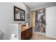 Bathroom with walk-in shower and decorative shower curtain at 1131 Via Tripoli, Punta Gorda, FL 33950