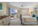 Main bedroom with water views and sliding glass doors at 1131 Via Tripoli, Punta Gorda, FL 33950