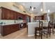 Modern kitchen with stainless steel appliances and custom cabinetry at 1131 Via Tripoli, Punta Gorda, FL 33950