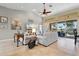 Spacious living area featuring lots of natural light and view of the pool at 1131 Via Tripoli, Punta Gorda, FL 33950