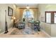 Bright and airy home office with a desk and relaxing armchair at 1131 Via Tripoli, Punta Gorda, FL 33950