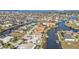 Aerial view of waterfront community, highlighting canal-front homes at 1220 Spanish Cay Ln, Punta Gorda, FL 33950