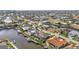 Aerial view of waterfront community with homes under construction at 1220 Spanish Cay Ln, Punta Gorda, FL 33950