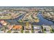 Aerial view of waterfront home with private dock and boat lift at 1220 Spanish Cay Ln, Punta Gorda, FL 33950