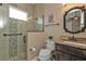 Well-appointed bathroom with walk-in shower and granite vanity at 1220 Spanish Cay Ln, Punta Gorda, FL 33950