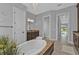 Spa-like bathroom with a large soaking tub and double vanity at 1220 Spanish Cay Ln, Punta Gorda, FL 33950