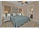 Bright bedroom with a king-size bed and ensuite bathroom at 1220 Spanish Cay Ln, Punta Gorda, FL 33950