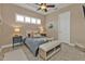 Charming bedroom with a queen-size bed and ensuite bathroom at 1220 Spanish Cay Ln, Punta Gorda, FL 33950