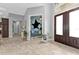 Bright and airy entryway with tiled floors and access to other rooms at 1220 Spanish Cay Ln, Punta Gorda, FL 33950