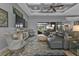 Relaxing living room with sectional sofa and large TV at 1220 Spanish Cay Ln, Punta Gorda, FL 33950