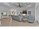 Spacious living room featuring a comfy seating area and tile floors at 1220 Spanish Cay Ln, Punta Gorda, FL 33950