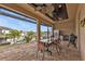 Relaxing outdoor kitchen and dining area overlooking the water at 1220 Spanish Cay Ln, Punta Gorda, FL 33950