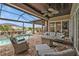 Spacious covered patio overlooking the pool at 1220 Spanish Cay Ln, Punta Gorda, FL 33950