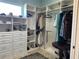 Large walk-in closet with ample shelving and hanging space at 1220 Spanish Cay Ln, Punta Gorda, FL 33950