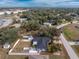 Aerial view showing house, yard, and pool at 1236 Fleetwood Nw Dr, Port Charlotte, FL 33948