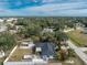 Aerial view of house, showing backyard and surrounding area at 1236 Fleetwood Nw Dr, Port Charlotte, FL 33948