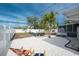 Relaxing backyard with swim spa and lounge chairs at 1236 Fleetwood Nw Dr, Port Charlotte, FL 33948