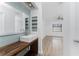 Modern bathroom with a floating vanity and subway tile at 1236 Fleetwood Nw Dr, Port Charlotte, FL 33948