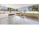 Screened patio with view of backyard and pool at 1236 Fleetwood Nw Dr, Port Charlotte, FL 33948