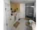 Spacious bathroom with walk-in shower and large jacuzzi tub at 1281 Nebraska Ln, North Port, FL 34286