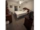 Bright bedroom with a king-size bed and plenty of natural light at 1281 Nebraska Ln, North Port, FL 34286