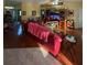 Spacious living room with hardwood floors at 1281 Nebraska Ln, North Port, FL 34286