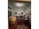 Home office with a desk, comfortable seating, and plenty of light at 1281 Nebraska Ln, North Port, FL 34286