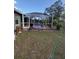 Inviting screened pool area with pink tile deck at 1281 Nebraska Ln, North Port, FL 34286