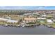 Aerial view of waterfront community with pool and boat docks at 1340 Rock Dove Ct # 135, Punta Gorda, FL 33950