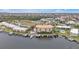 Aerial view of waterfront community with pool and boat slips at 1340 Rock Dove Ct # 135, Punta Gorda, FL 33950