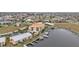 Aerial view showing building location and waterfront access at 1340 Rock Dove Ct # 135, Punta Gorda, FL 33950